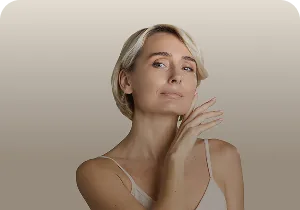 Woman with smooth skin touching her face – biomodulators