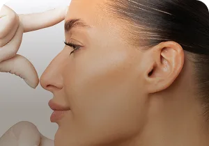 Woman's profile during nose contouring – non-surgical nose reshaping