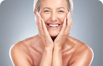 Polynucleotides after intensive treatments – smiling woman with her hands on her face